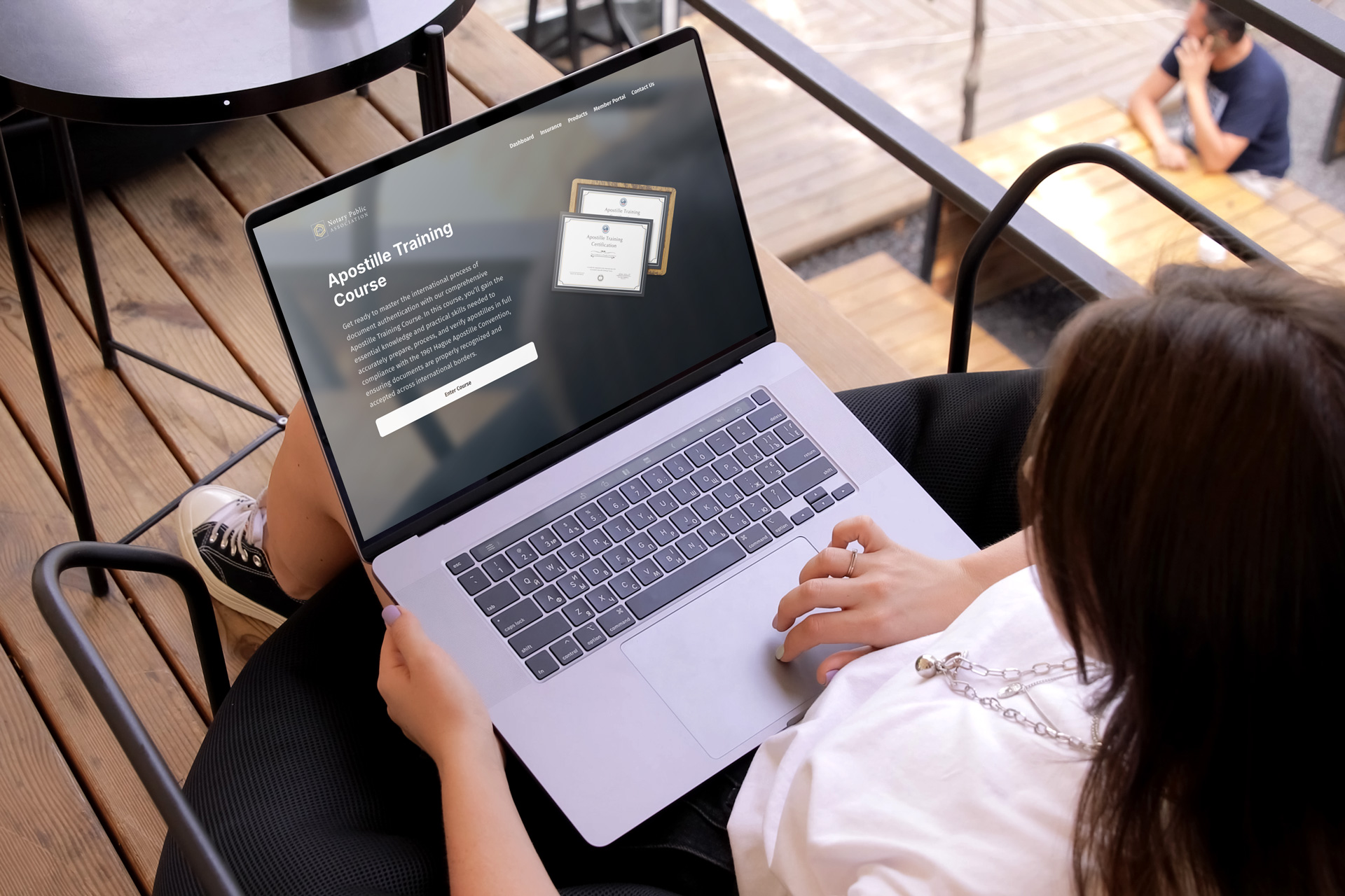 Person viewing apostille process on laptop