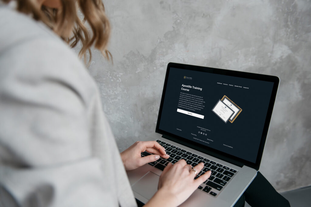 Apostille Training Course cover on the computer with student taking the course