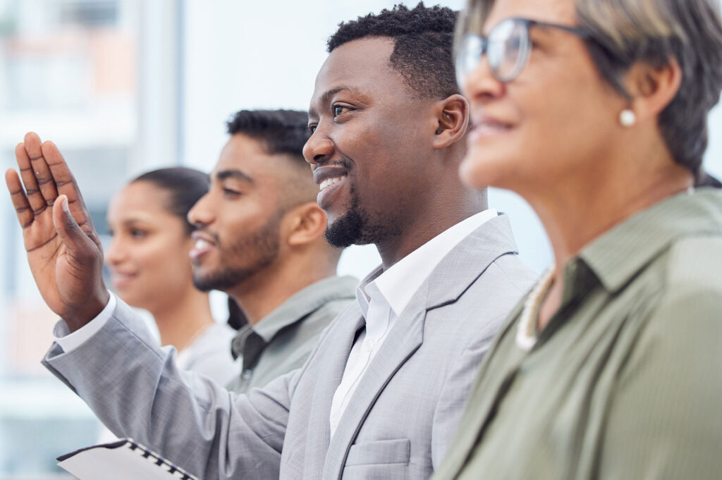 group of people swearing an oath